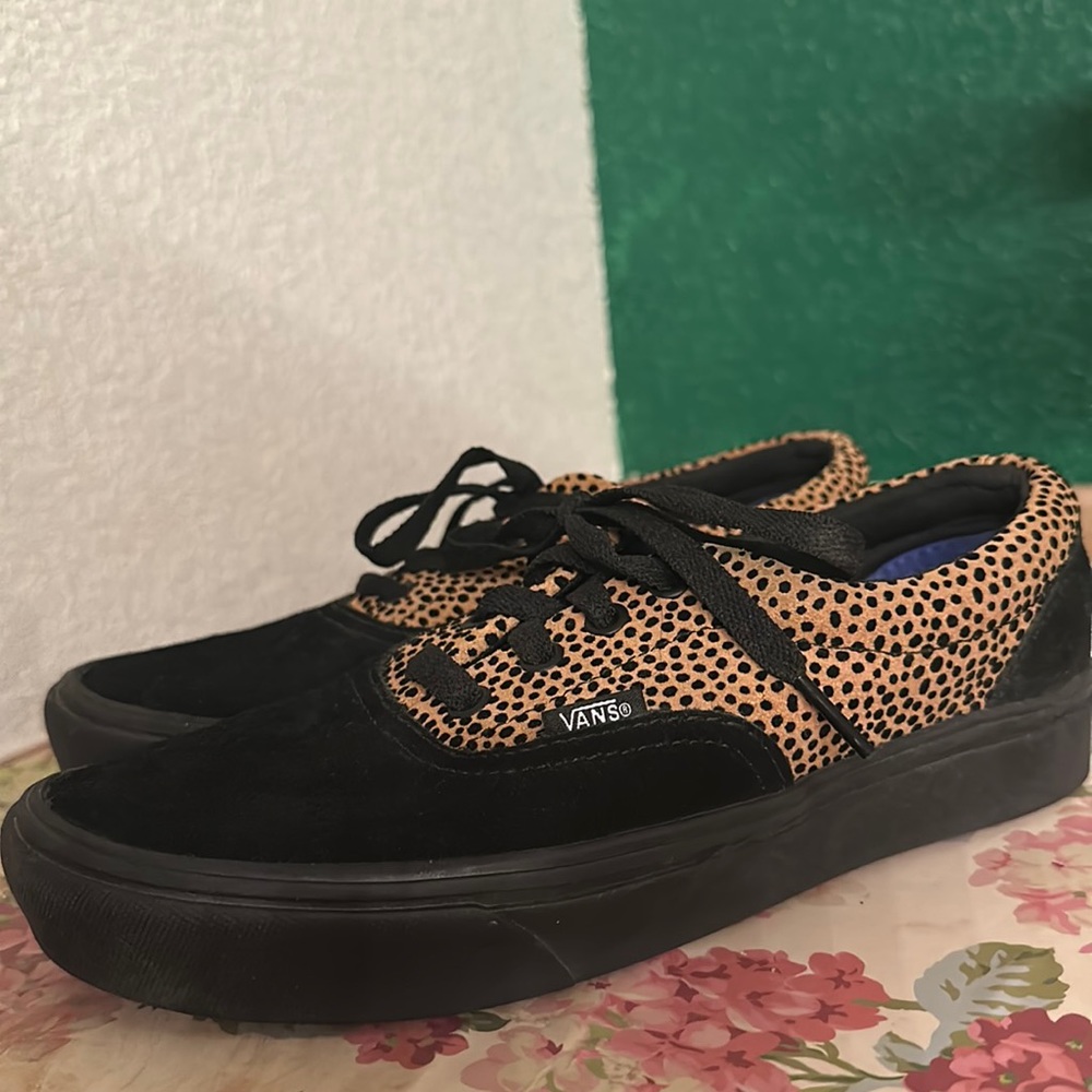 Black and cheetah print vans with shoe lace. Suede material. Never worn.